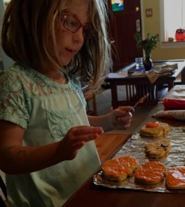 Child decorating cookies