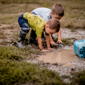 mucking in the mud