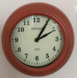Red clock with hands